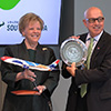 President Rhea Law holds airplane at TPA signing