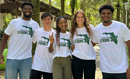 Group wears Tampa Bay Strong t-shirts