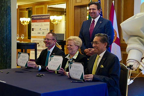 USF President Rhea Law, TGH Cancer Institute Executive Director Dr. Eduardo Sotomayor and MMI President and CEO Mark Toland pose with Florida Governor Ron DeSantis