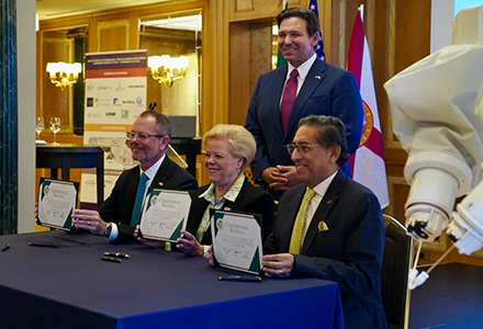 USF President Rhea Law and Dr. Nicholas Panetta, chief of TGH Plastic Surgery and chair of the Department of Plastic Surgery in the USF Health Morsani College of Medicine.