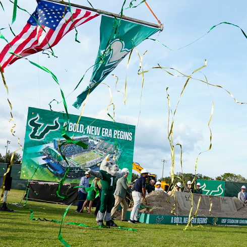 Groundbreaking celebration with Rocky the Bull and stadium signage