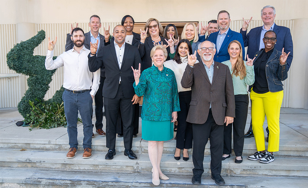 Leadership USF inaugural class poses in front of the Lifsey House