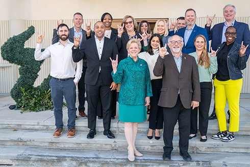 Leadership USF inaugural class poses in front of the Lifsey House