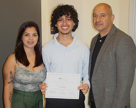 Julio with his parents