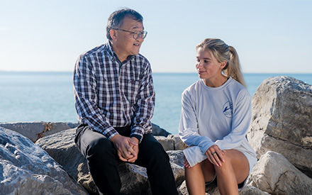 USF Professor Ping Wang and Libby Royer on the beach