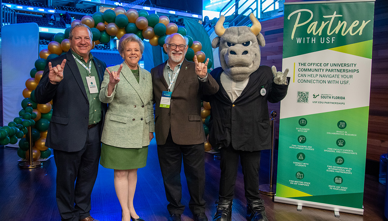 Synapse co-founder Andy Hafer, President Rhea Law and Eric Eisenberg, senior vice president for University-Community Partnerships