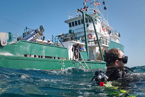 Divers near USF research vessel