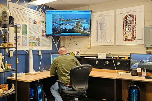 Expert sitting on the computer