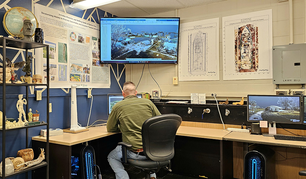 Expert sitting on the computer