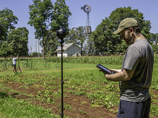 USF’s Benjamin Mittler and Denise Wright work to capture 360 terrains at the Jimmy Carter Boyhood Farm location. (Photo credit Frank Rodriquez).