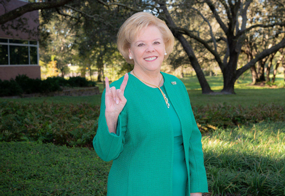 President Rhea Law gives the Go Bulls sign