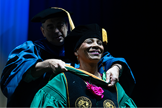 Woman gets her doctoral degree on stage