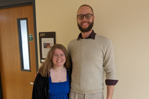 USF Applied Linguistic students Molly Schilling and Larry Grullon-Polanco smile for a photo. 