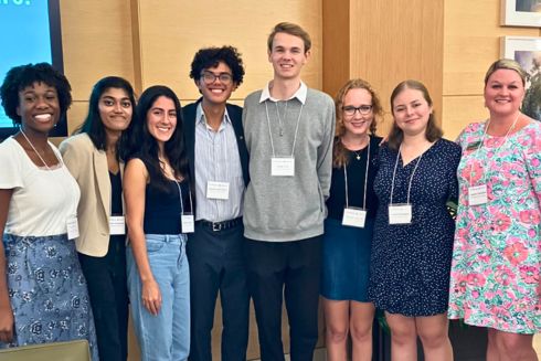 A group of students pose with Fulbright Program Advisor, Lauren Chambers.