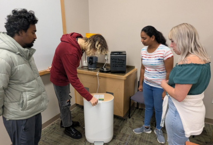 Students Using the Food Grinder