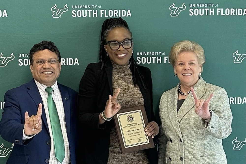 Provost Mohapatra, Professor Akintewe and President Rhea Law