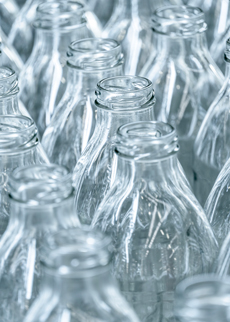 Glass strengthening and lightweighting for beverage packaging