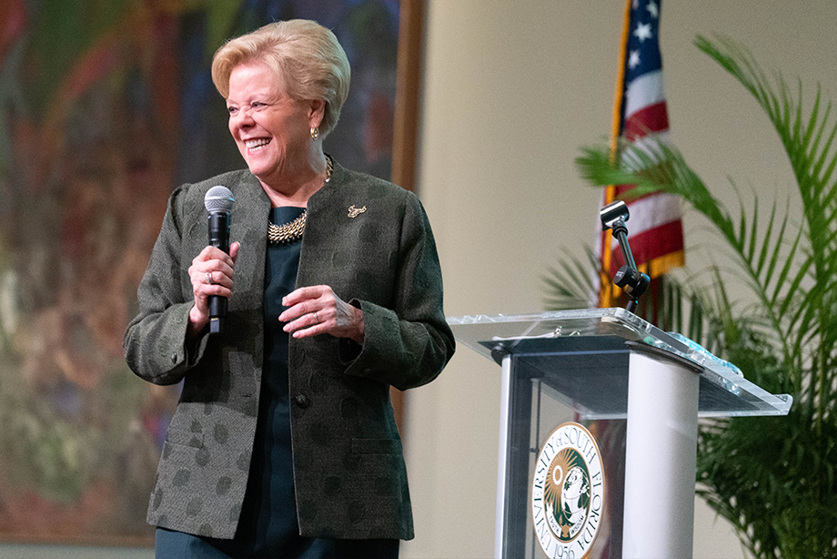 USF president Rhea Law holding a microphone