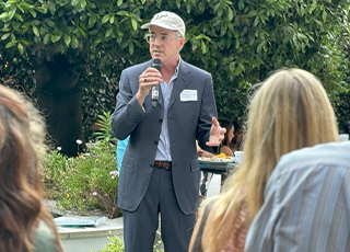 David Mearns addresses fellow alums and USF in London students.