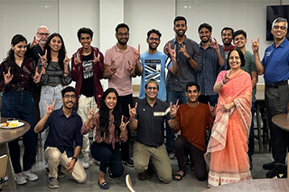 group of students with USF Professor Kaushik Dutta and Aruna Dasgutpa on far right