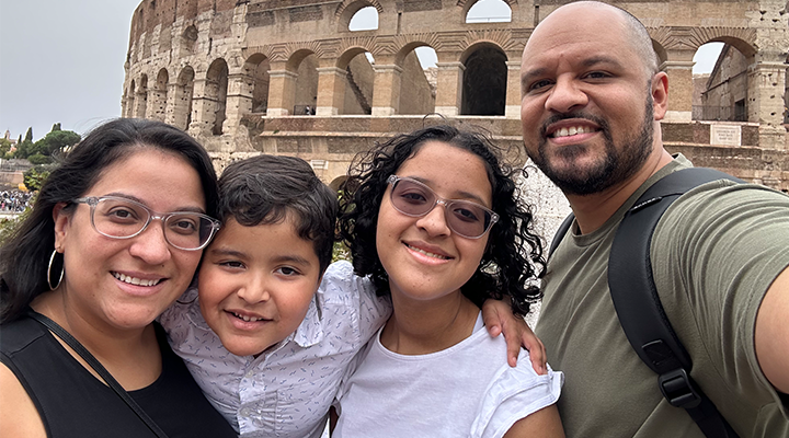 collazo family taking a group selfie in front of the colosseum