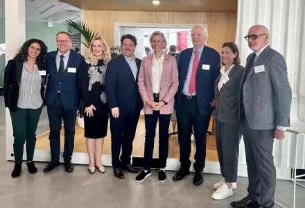 Tampa, USF, and EM Normandie Business School representatives stand for a group photo while visiting the school in Le Havre, France