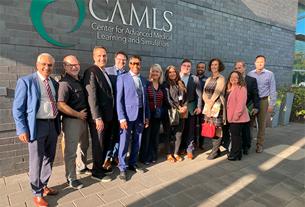 group shot of the Canada-Florida Chamber of Commerce with representatives from USF at CAMLS in downtown Tampa, FL