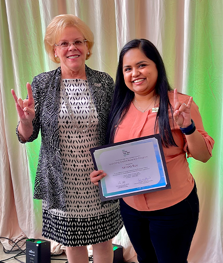 Dr. Rhea Law posing with Nirmita Roy