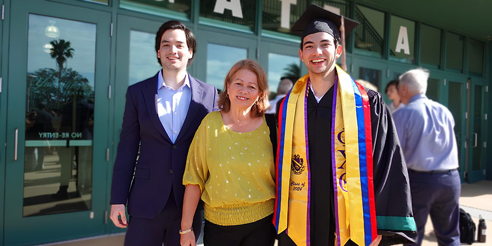 Castillo with his mother and brother after graduation