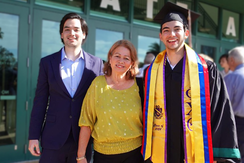 Castillo with his mother and brother after graduation