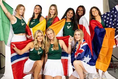 USF WTEN team with flags 2025