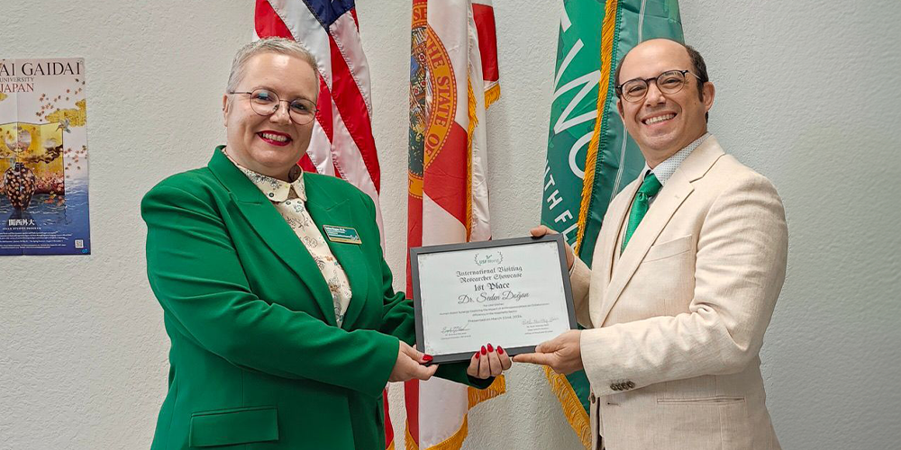 Professor Dogan and Sarasota-Manatee campus director, Brandon McLeod